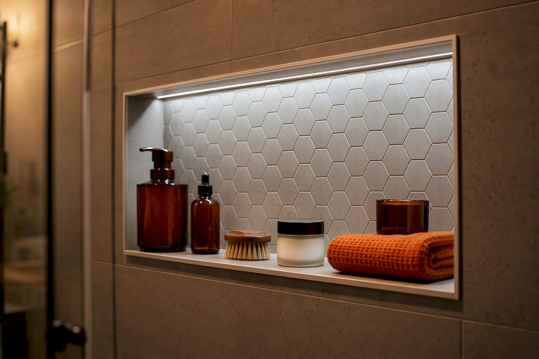 Backlit tiled shower niche with concealed LED